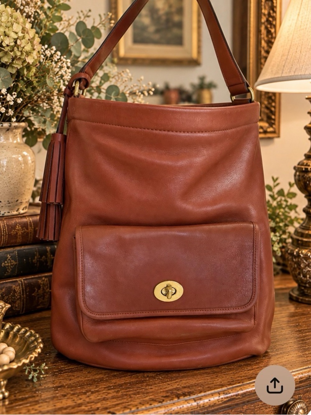 Ready for fall? Rust colour Coach Legacy shoulder bag